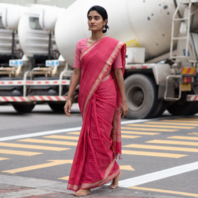 Pink Pure Handwoven Zari Checks Mangalagiri Cotton Saree, draped and worn by a woman, AI visual of the saree, iTokri