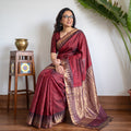 Maroon Pure Kosa Tussar Silk Handloom Jala Weave Saree, draped and worn by a woman, AI visual of the saree, iTokri