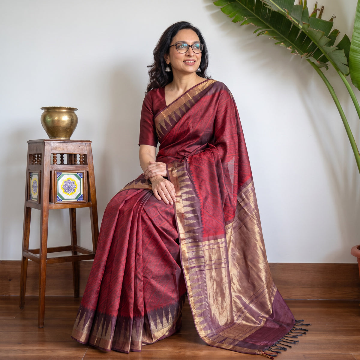 Maroon Pure Kosa Tussar Silk Handloom Jala Weave Saree, draped and worn by a woman, AI visual of the saree, iTokri