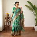 Green Pure Kosa Tussar Silk Pure Handloom Saree with Temple Woven Border, draped and worn by a woman, AI visual of the saree, iTokri