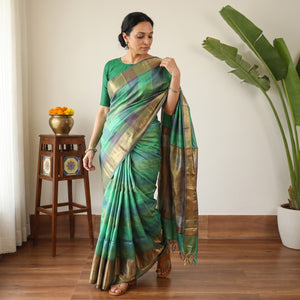 Green Pure Kosa Tussar Silk Pure Handloom Saree with Temple Woven Border, draped and worn by a woman, AI visual of the saree, iTokri