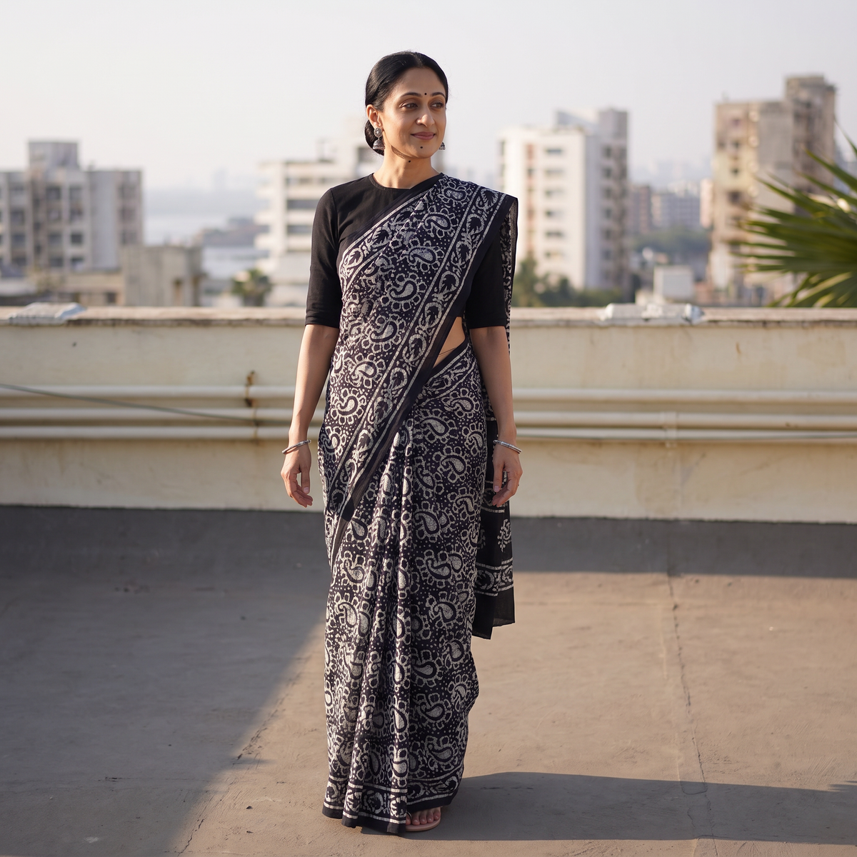 Blue Pure Mul Cotton Hand Block Batik Print Saree, draped and worn by a woman, AI visual of the saree, iTokri