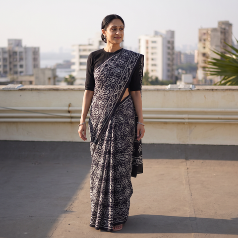 Blue Pure Mul Cotton Hand Block Batik Print Saree, draped and worn by a woman, AI visual of the saree, iTokri