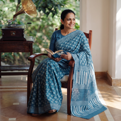Blue Pure Mul Cotton Hand Block Batik Print Saree, draped and worn by a woman, AI visual of the saree, iTokri
