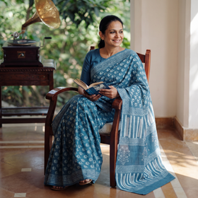 Blue Pure Mul Cotton Hand Block Batik Print Saree, draped and worn by a woman, AI visual of the saree, iTokri