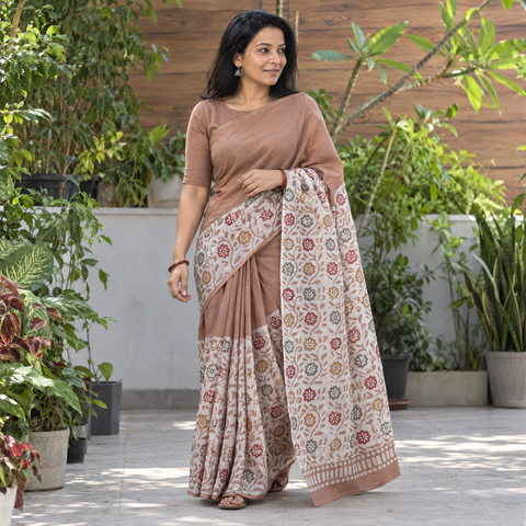 Brown Pure Mul Cotton Hand Block Batik Print Saree, draped and worn by a woman, AI visual of the saree, iTokri
