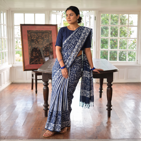 Blue Pure Mul Cotton Hand Block Batik Print Saree, draped and worn by a woman, AI visual of the saree, iTokri