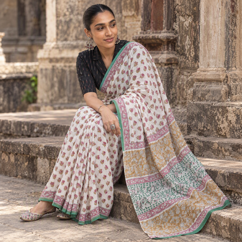 White pure mul cotton hand block Sanganeri print saree, draped and worn by a woman, AI visual of the saree, iTokri