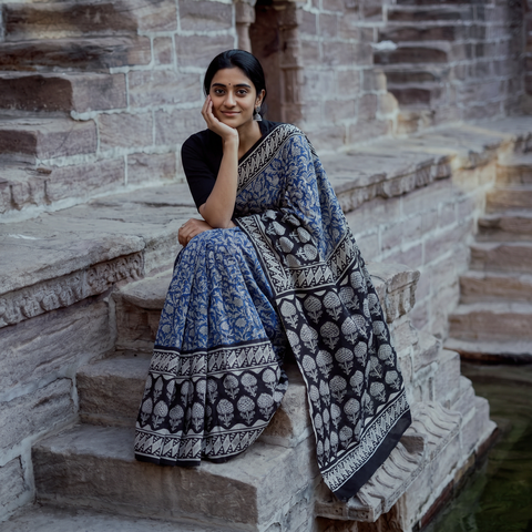 Blue Pure Mul Cotton Natural Dyed Hand Block Bagru Print Saree, draped and worn by a woman, AI visual of the saree, iTokri