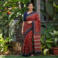 Red Pure Mul Cotton Natural Dyed Hand Block Bagru Print Saree, draped and worn by a woman, AI visual of the saree, iTokri