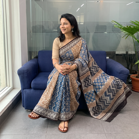 Multicolor Pure Mul Cotton Natural Dyed Hand Block Bagru Print Saree, draped and worn by a woman, AI visual of the saree, iTokri