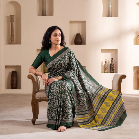 Green Pure Mul Cotton Natural Dyed Hand Block Bagru Print Saree, draped and worn by a woman, AI visual of the saree, iTokri
