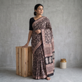Black Pure Mul Cotton Natural Dyed Hand Block Bagru Print Saree, draped and worn by a woman, AI visual of the saree, iTokri