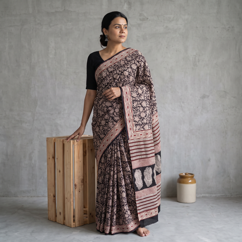 Black Pure Mul Cotton Natural Dyed Hand Block Bagru Print Saree, draped and worn by a woman, AI visual of the saree, iTokri