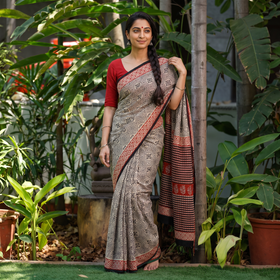 Black Pure Mul Cotton Natural Dyed Hand Block Dabu Bagru Print Saree, draped and worn by a woman, AI visual of the saree, iTokri
