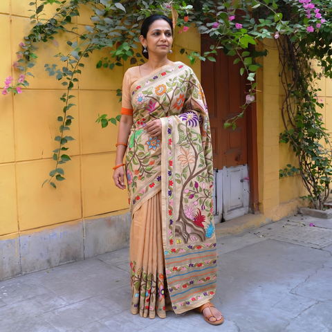 Beige Pure Tussar Silk Handloom Bengal Kantha Hand Embroidered Saree, draped and worn by a woman, AI visual of the saree, iTokri