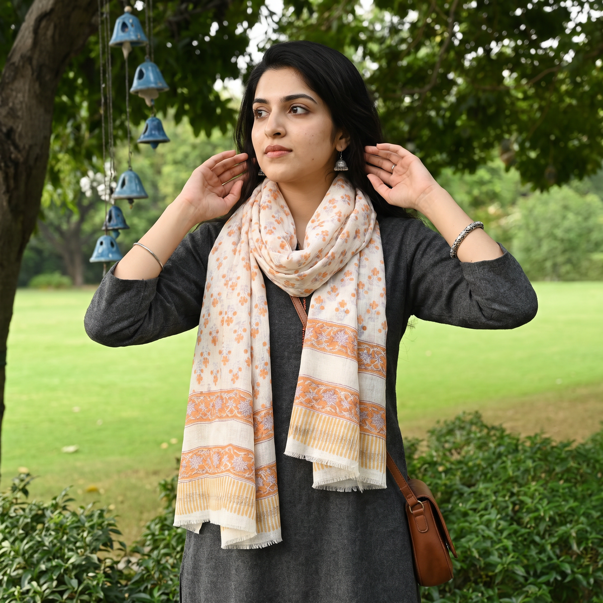Orange Pure Wool Block Print Sanganeri Stole, worn by a woman, AI visual of the stole, iTokri