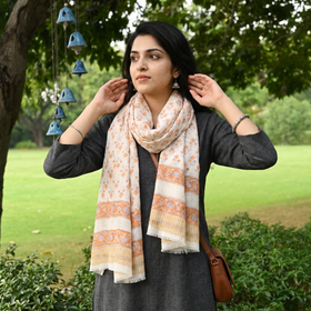 Orange Pure Wool Block Print Sanganeri Stole, worn by a woman, AI visual of the stole, iTokri