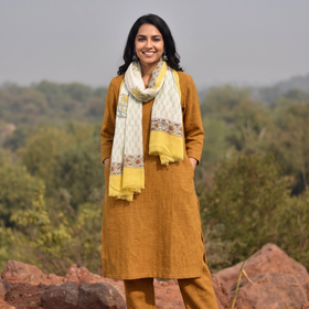 Yellow Pure Wool Hand Block Print Sanganeri Stole, worn by a woman, AI visual of the stole, iTokri