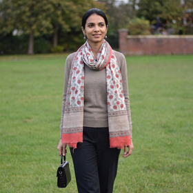 Pink Pure Wool Hand Block Print Sanganeri Stole, worn by a woman, AI visual of the stole, iTokri