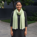 Green Pyramid Zari Weave Fine Wool Stole, worn by a woman, AI visual of the stole, iTokri