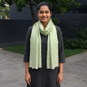 Green Pyramid Zari Weave Fine Wool Stole, worn by a woman, AI visual of the stole, iTokri