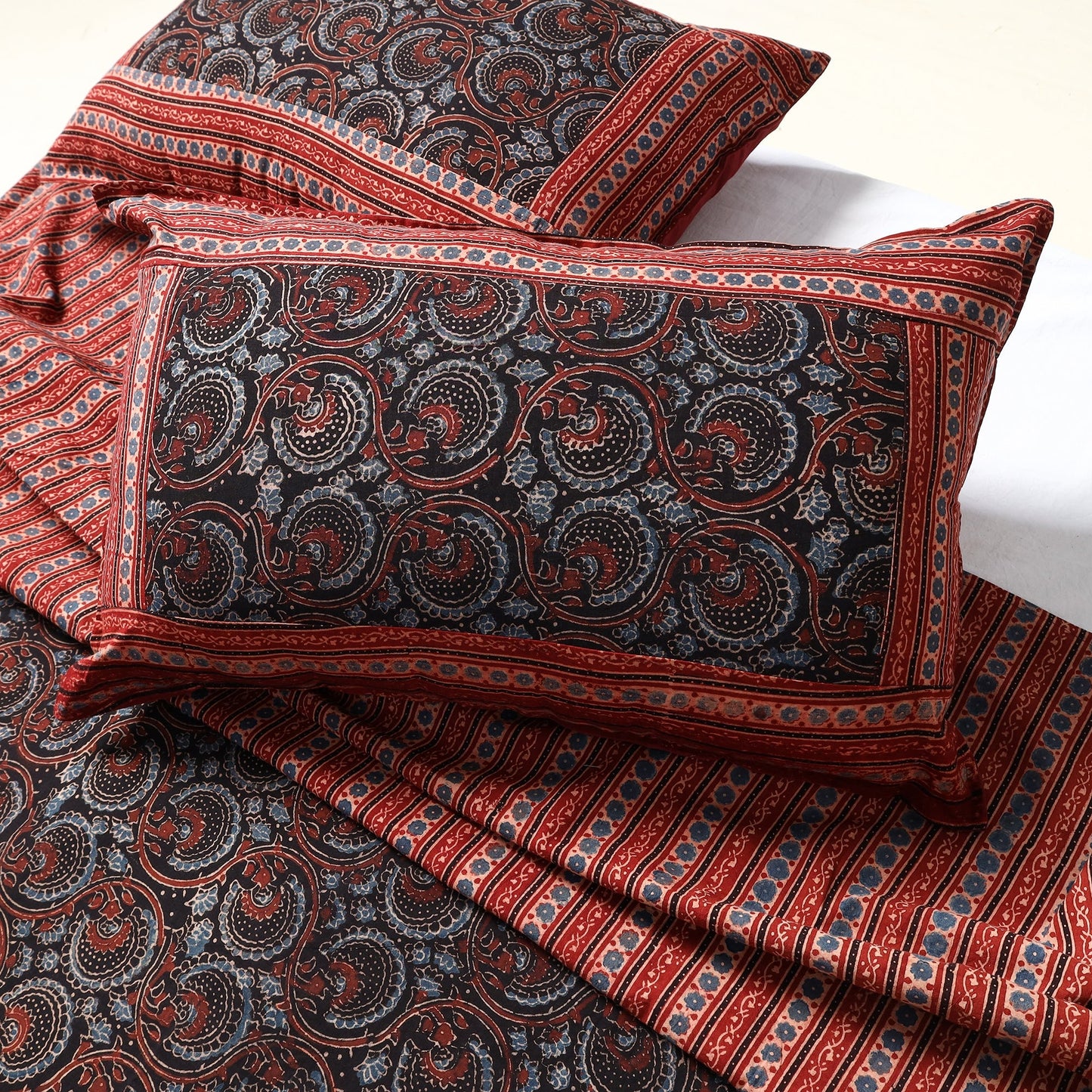Red - printed patchwork cotton double bed cover with pillow