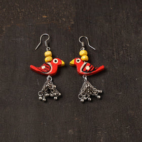 Red - aliya german silver jhumki earrings with wooden bird