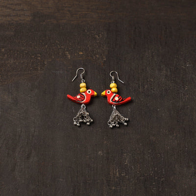 Red - aliya german silver jhumki earrings with wooden bird