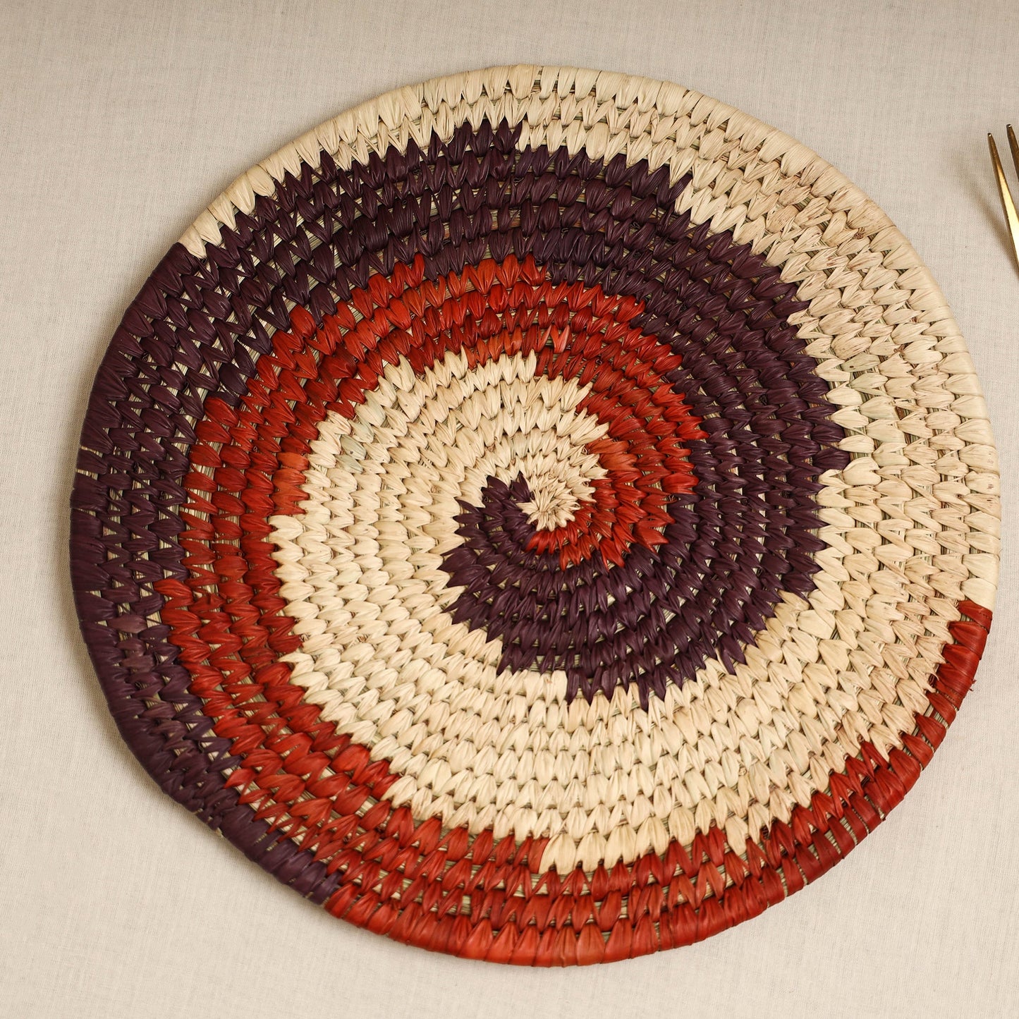 Red - handcrafted eco-friendly sabai grass spiral mat 11