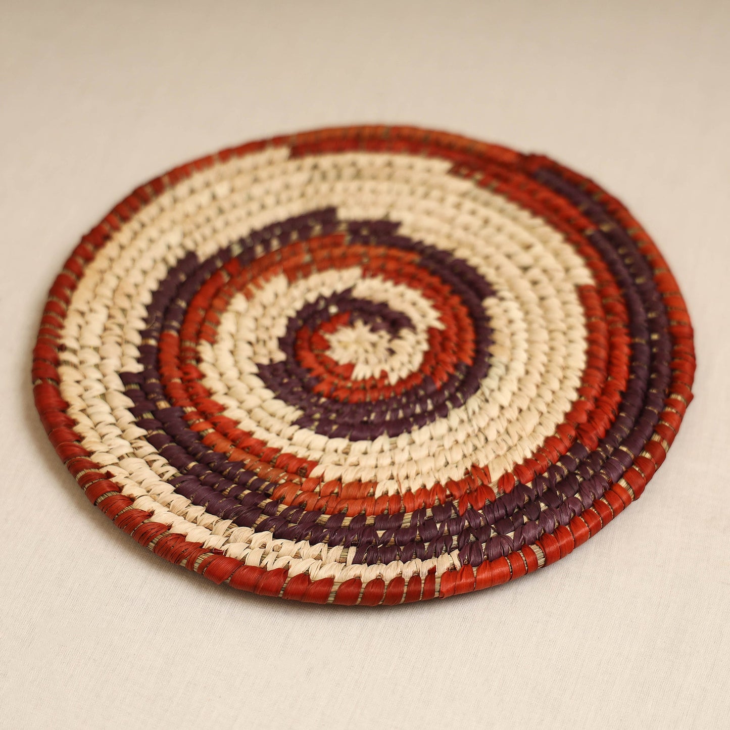 Red - handcrafted eco-friendly sabai grass spiral mat 12