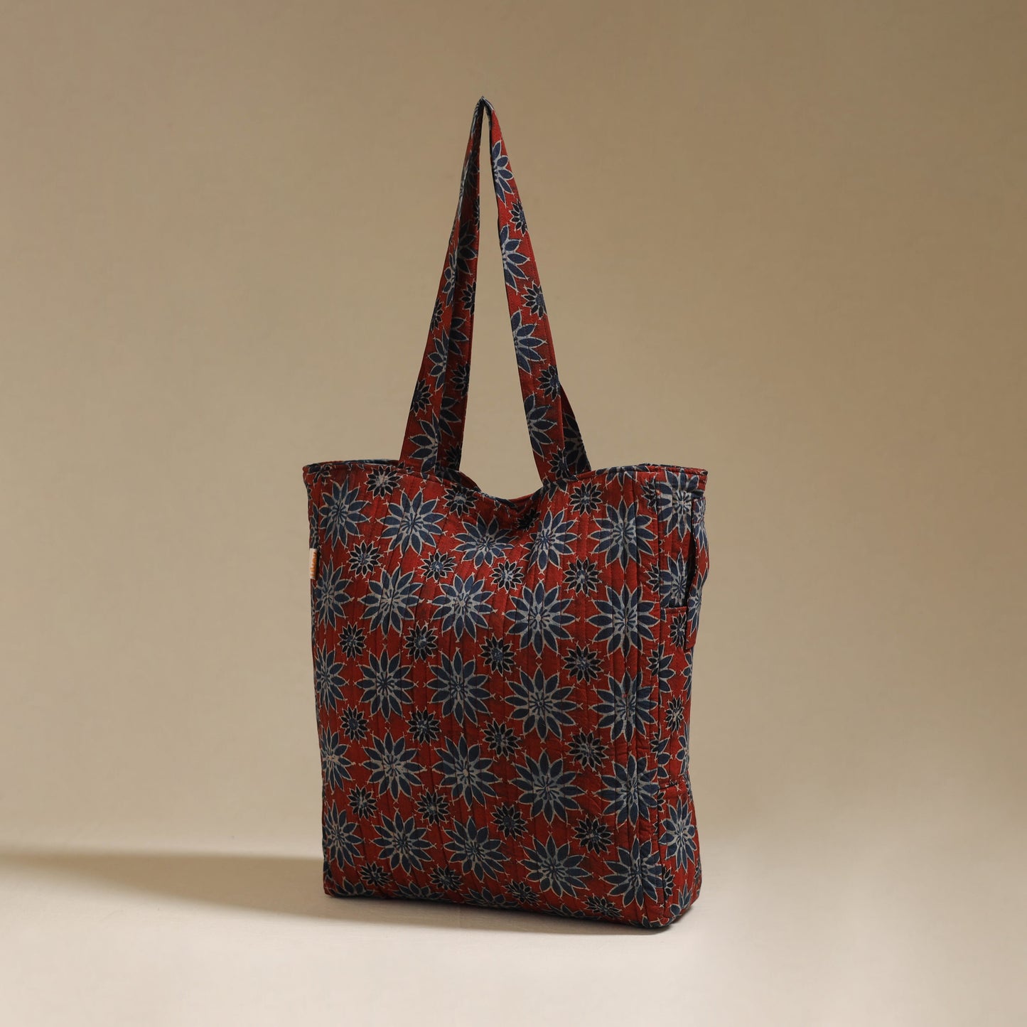 Handcrafted quilted ajrakh block printed fabric tote bag
