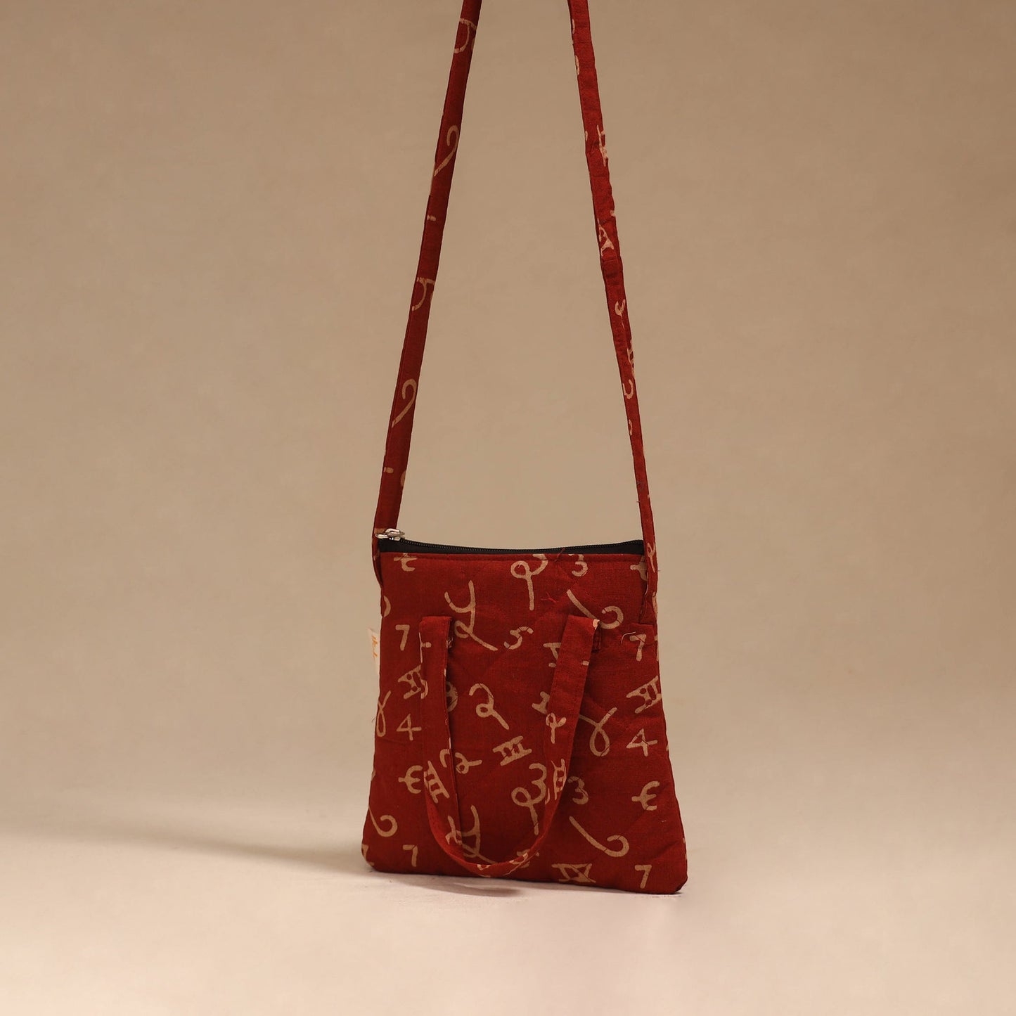 Handcrafted quilted sling bag 34