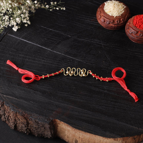 Handcrafted tribal dokra brass thread rakhi 11