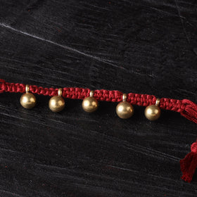 Handcrafted tribal dokra brass thread rakhi 13