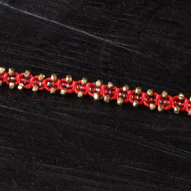 Handcrafted tribal dokra brass thread rakhi 16