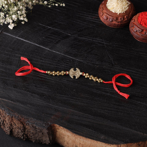 Handcrafted tribal dokra brass thread rakhi 17