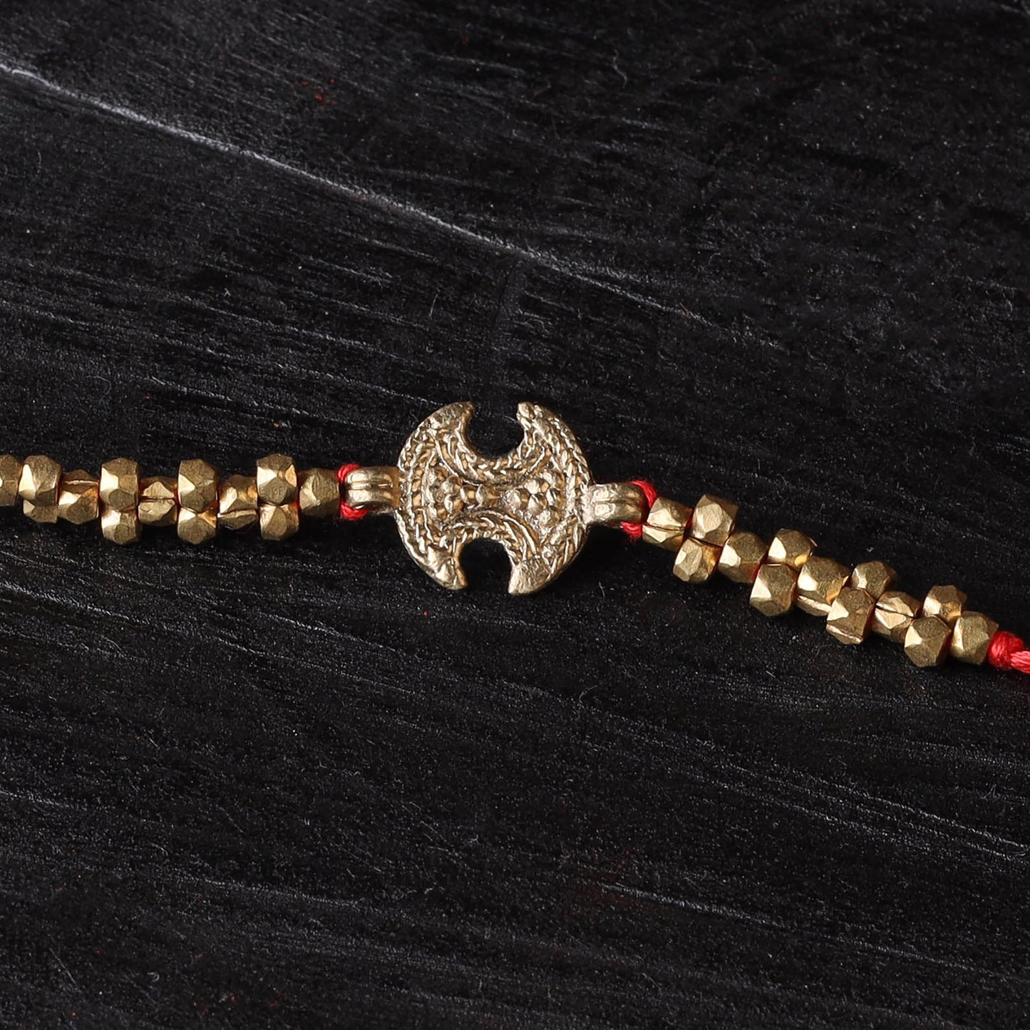Handcrafted tribal dokra brass thread rakhi 17