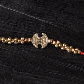 Handcrafted tribal dokra brass thread rakhi 17