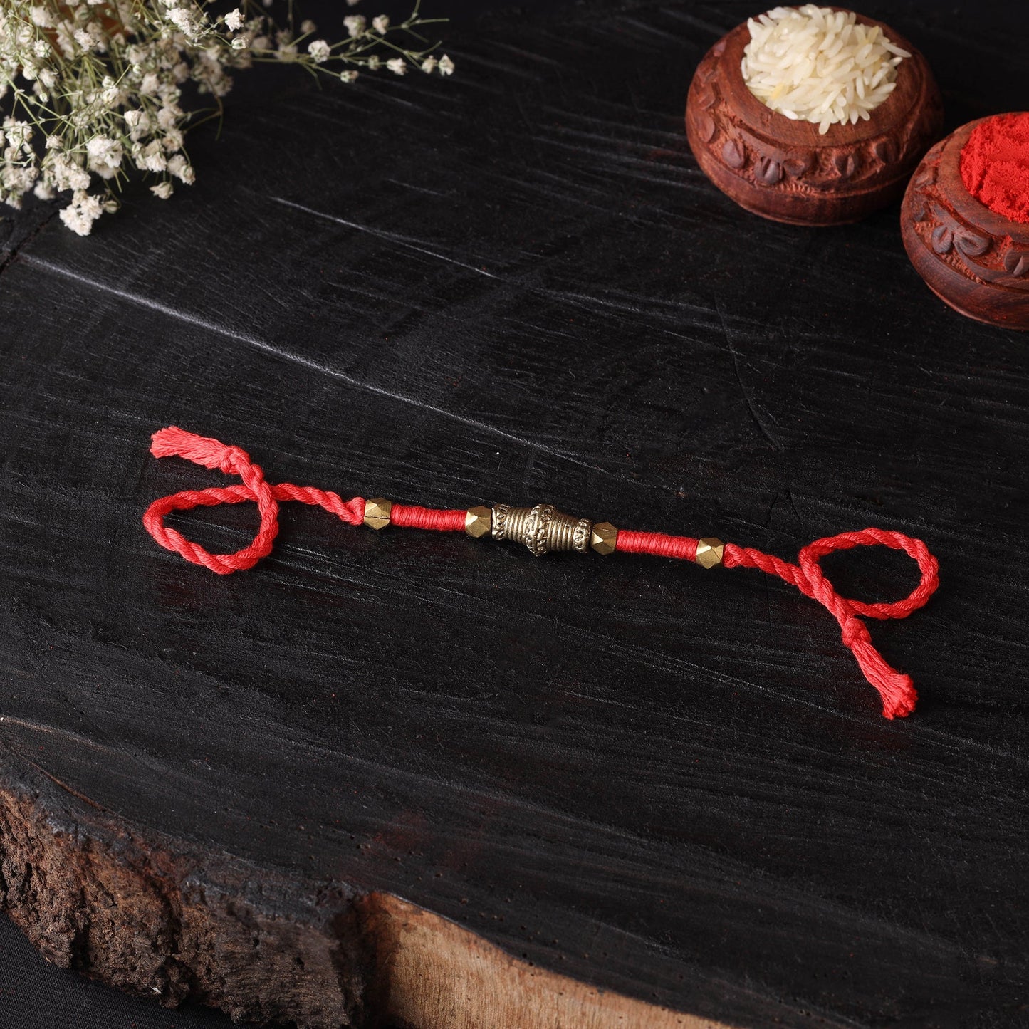 Handcrafted tribal dokra brass thread rakhi 20