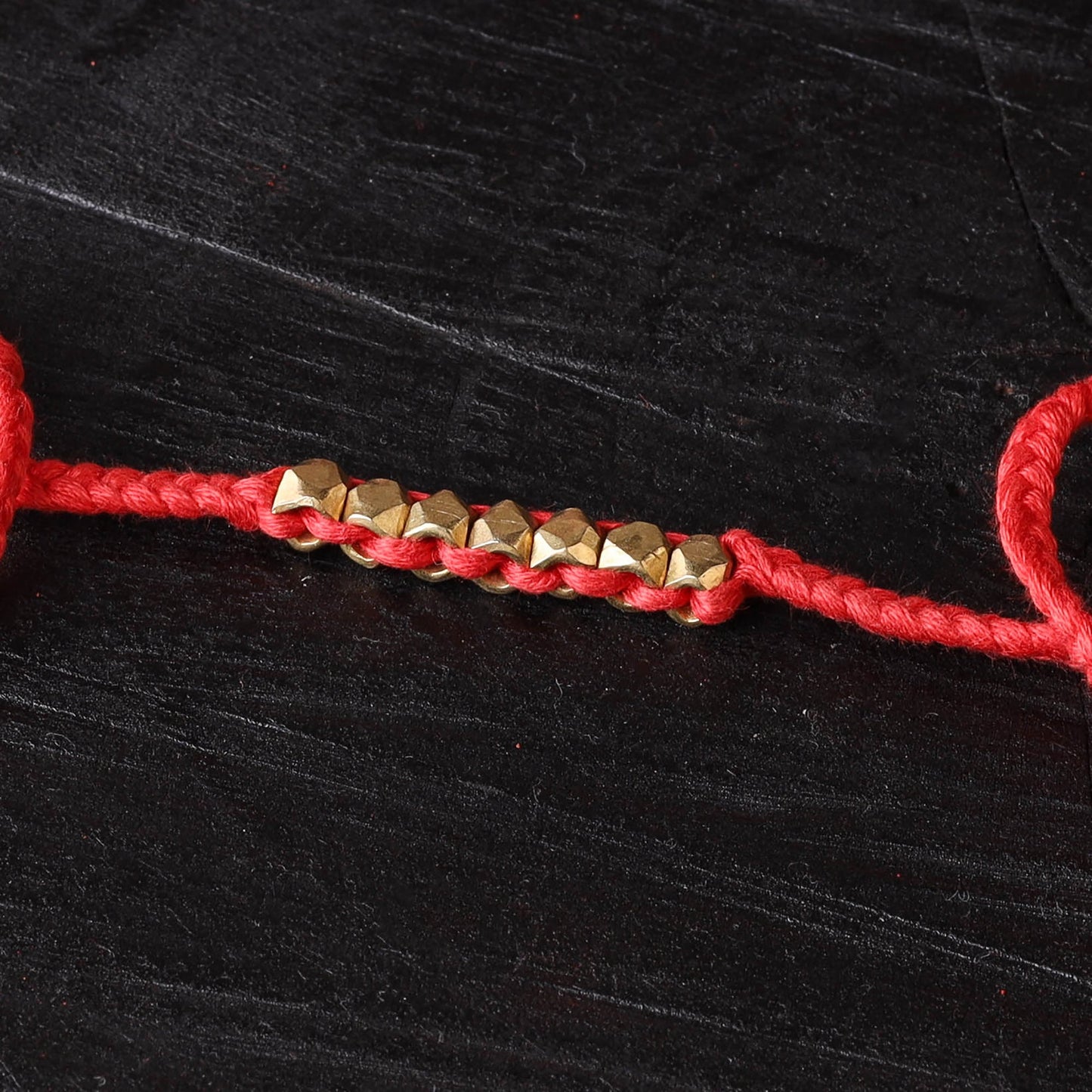 Handcrafted tribal dokra brass thread rakhi 22