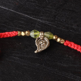 Handcrafted tribal dokra brass thread rakhi 23