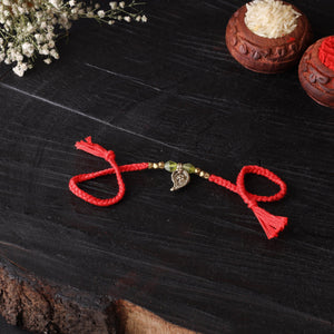 Handcrafted tribal dokra brass thread rakhi 23