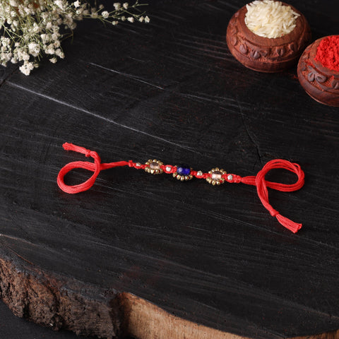 Handcrafted tribal dokra brass thread rakhi 31
