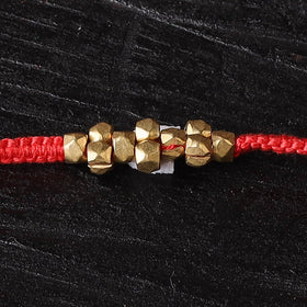 Handcrafted tribal dokra brass thread rakhi 42