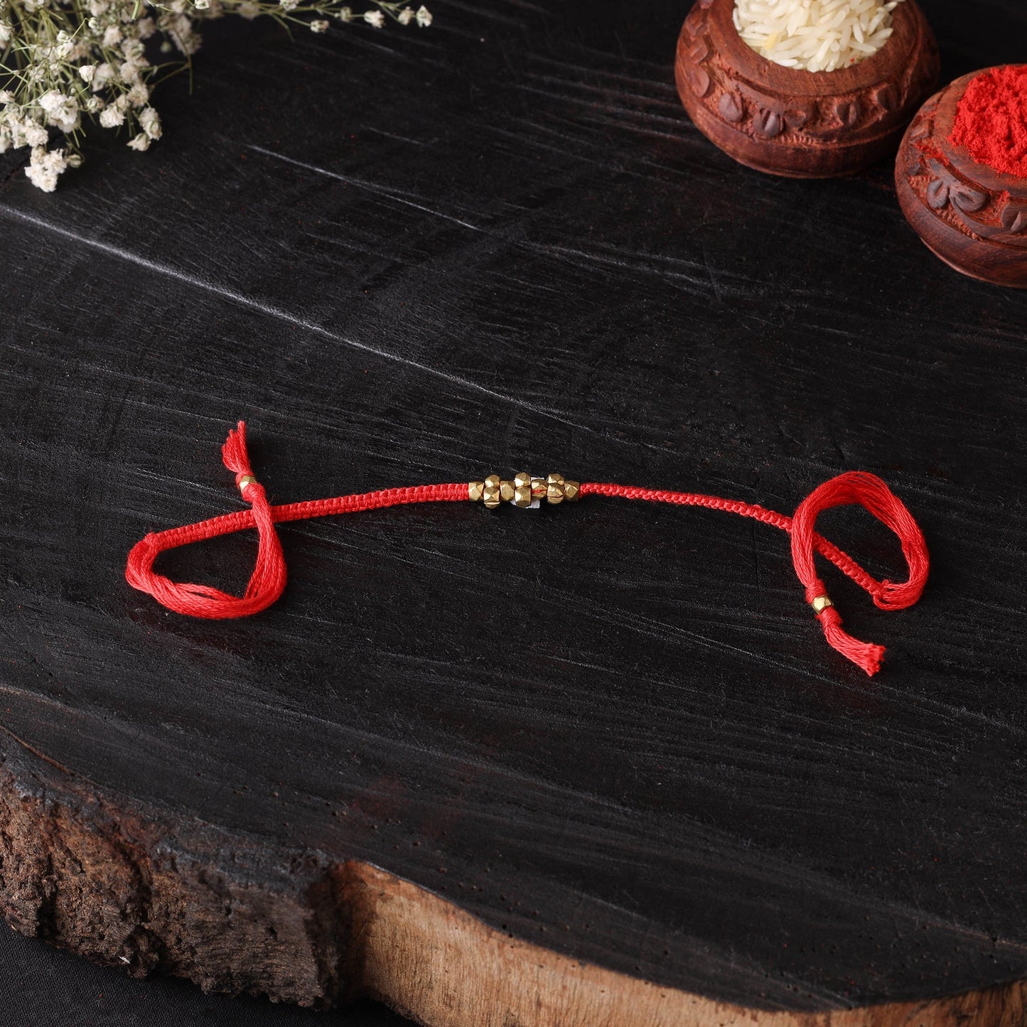 Handcrafted tribal dokra brass thread rakhi 42