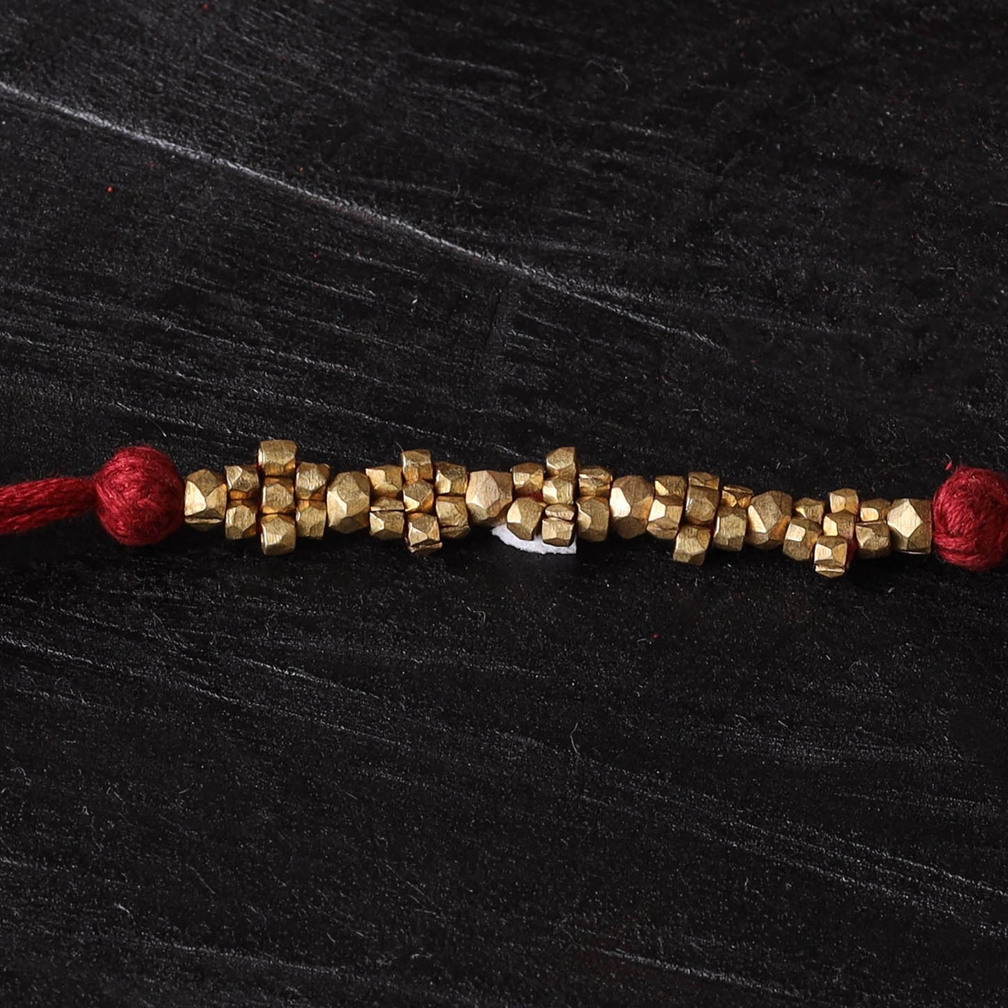 Handcrafted tribal dokra brass thread rakhi 45