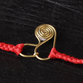 Handcrafted tribal dokra brass thread rakhi 55