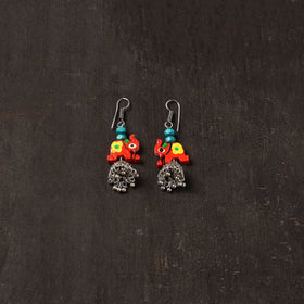 Red - vaani german silver jhumki earrings with wooden