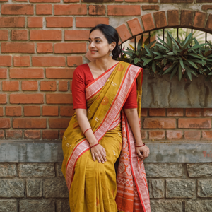 Yellow Sambalpuri Handloom Cotton Bomkai Saree with Blouse Piece, draped and worn by a woman, AI visual of the saree, iTokri